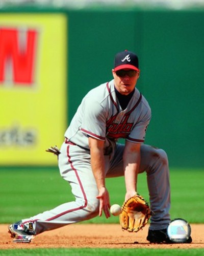 Chipper Jones on Chipper Jones Mlb Action Fielding Photo Dragon Sports